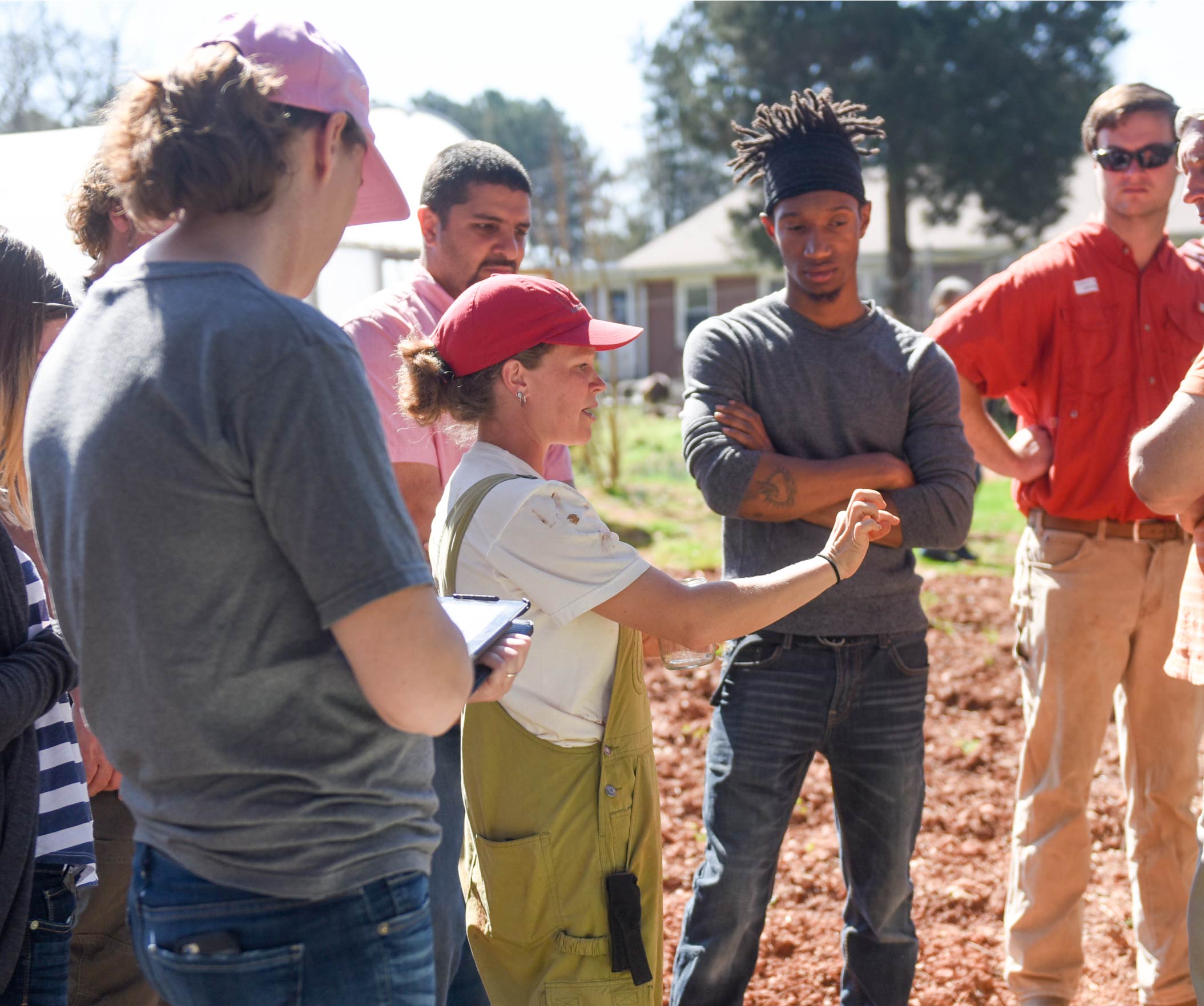 particapants listening to an on-farm presentation